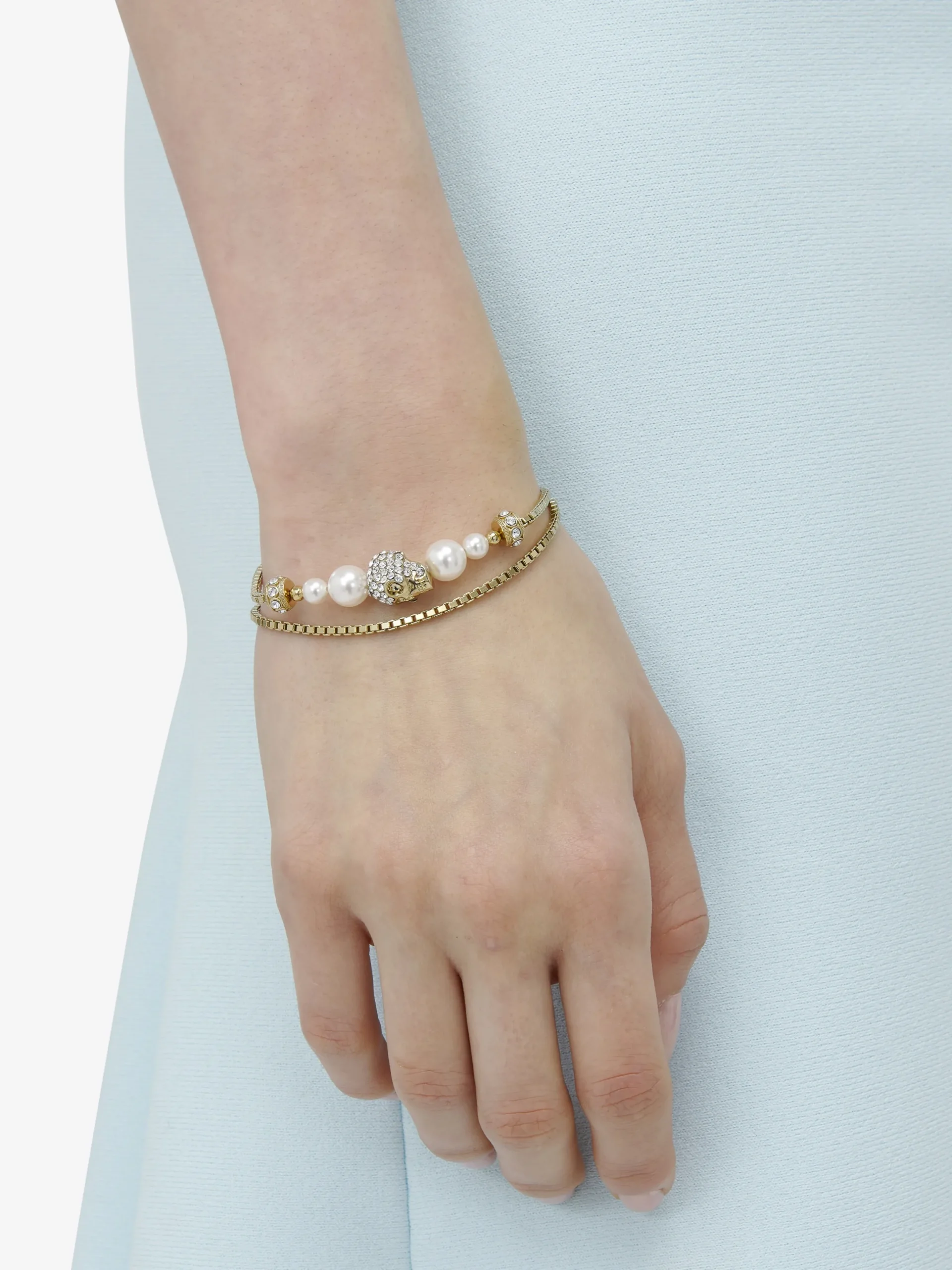 Bracciale a catena Skull con perla da Donna in Finitura oro pallido